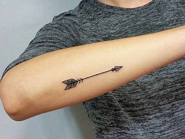 10. Arrow Tattoo Designs with Symbols for Women - wide 4