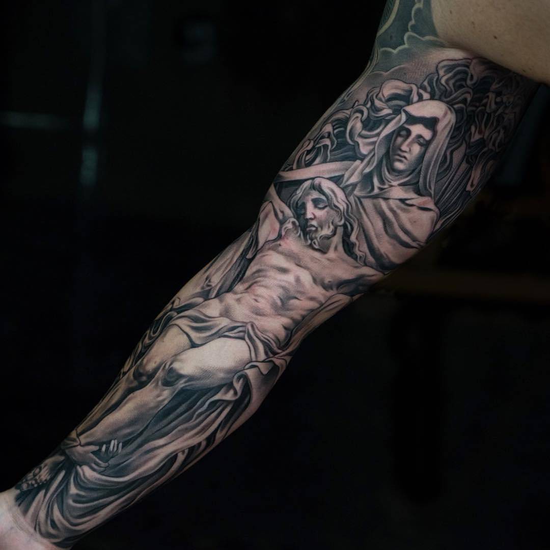 virgin mary forearm tattoo