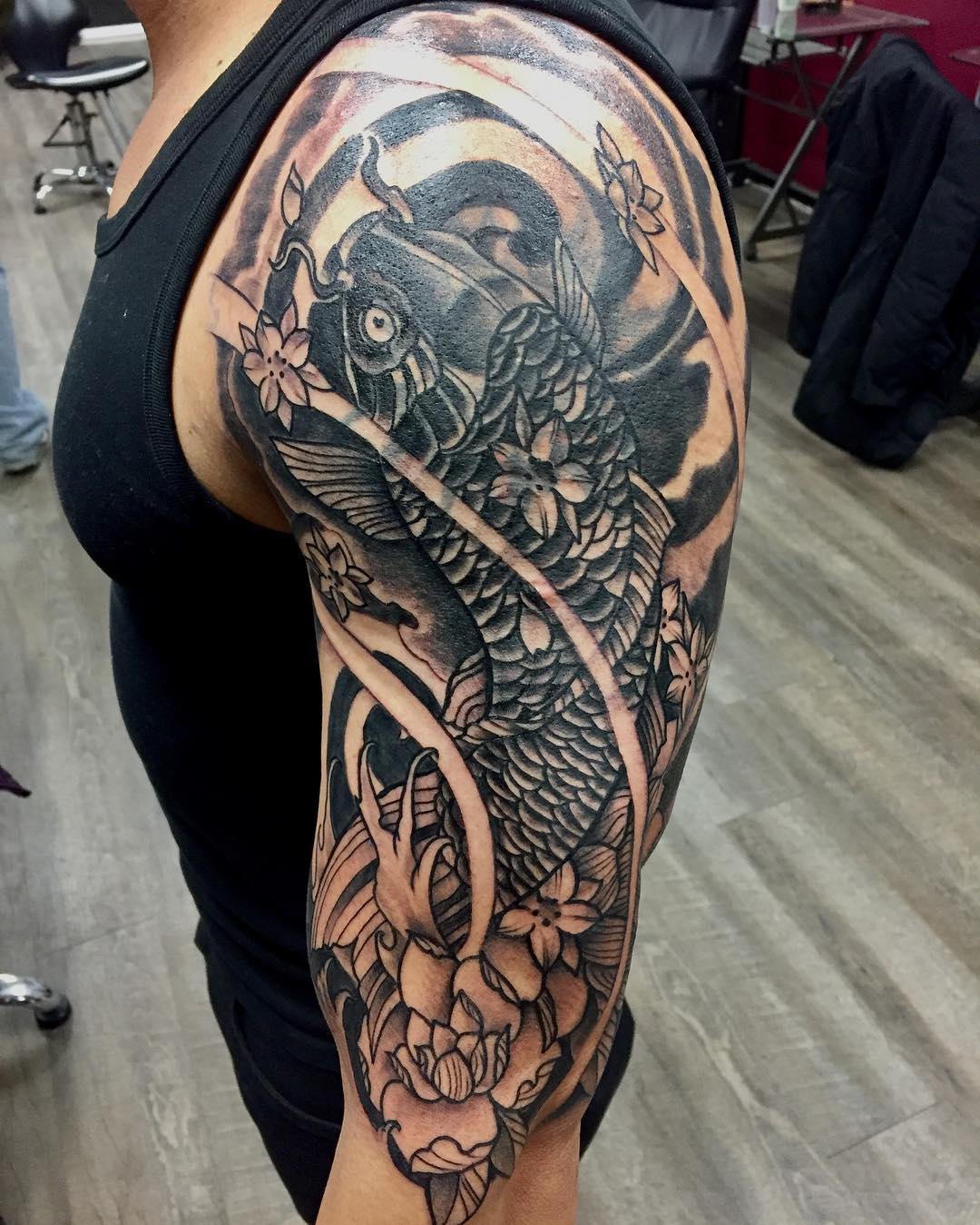 Shoulder Colored Koi Fish Tattoo Design Under Asia