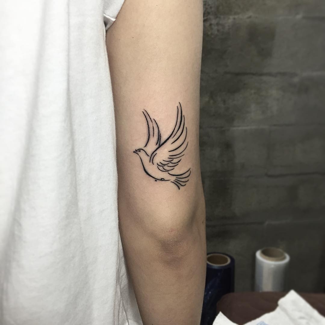 behind the ear dove tattoos