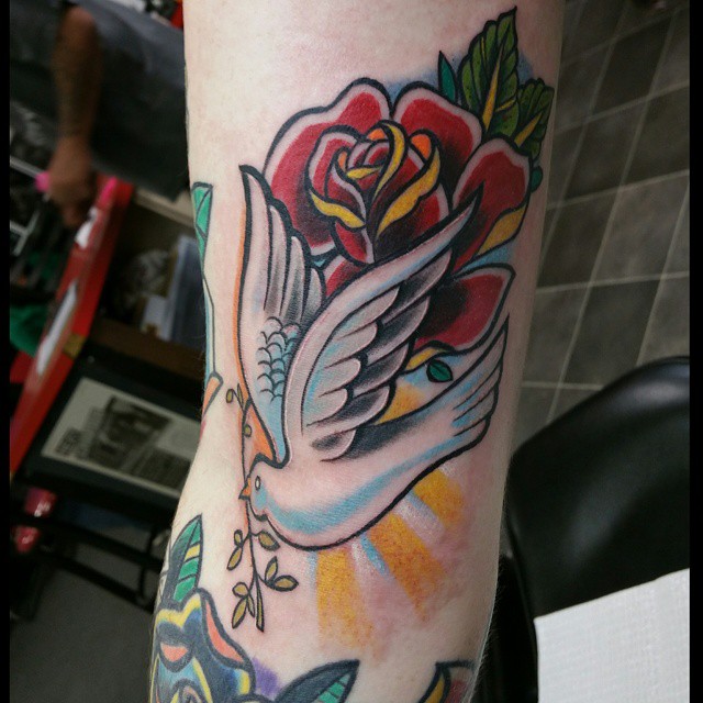 colorful dove tattoo