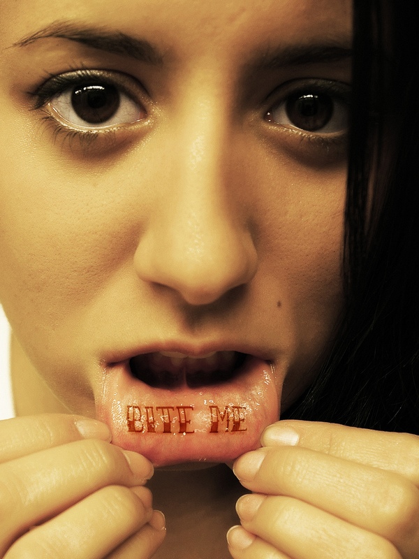 Lip Tattoo (13 years later) : r/agedtattoos