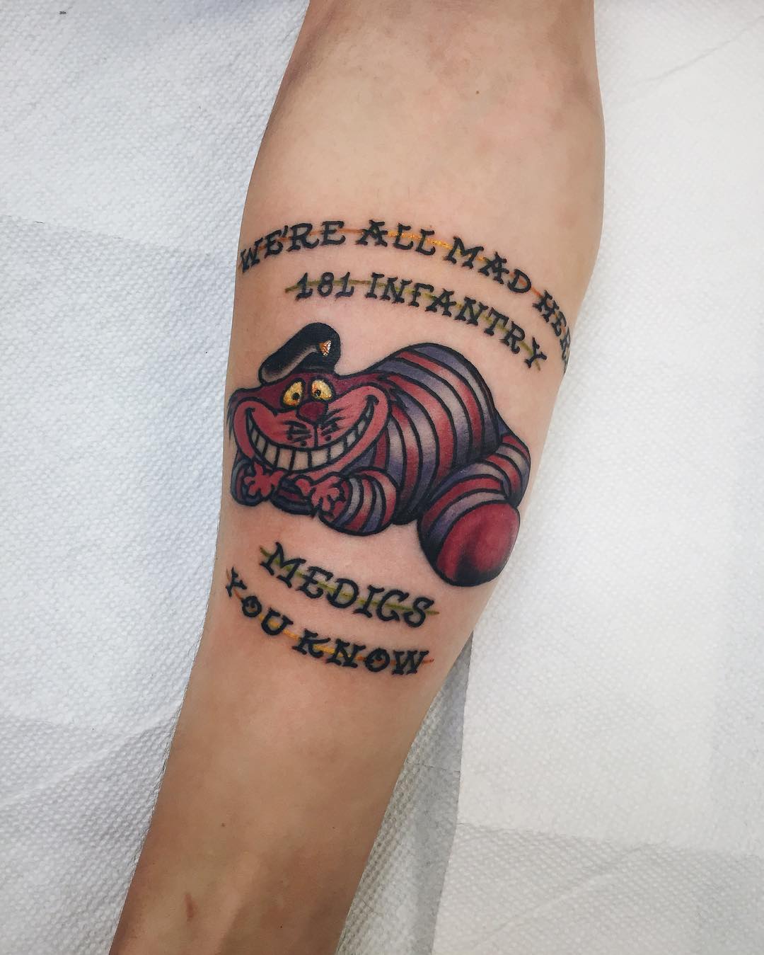 Meaningful alice in wonderland tattoos