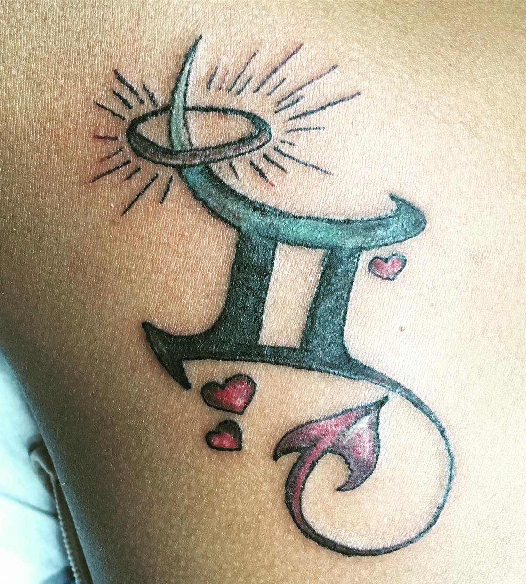 gemini animal sign tattoo