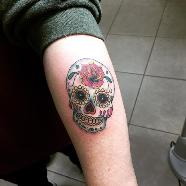 tiny sugar skull tattoo