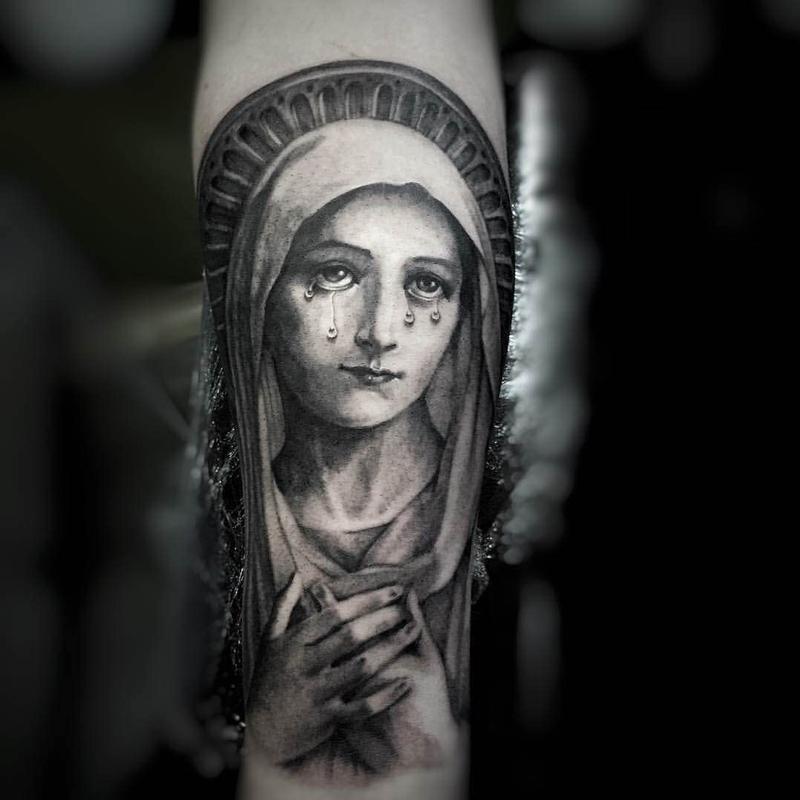 Meaning of Virgin Mary tattoos.