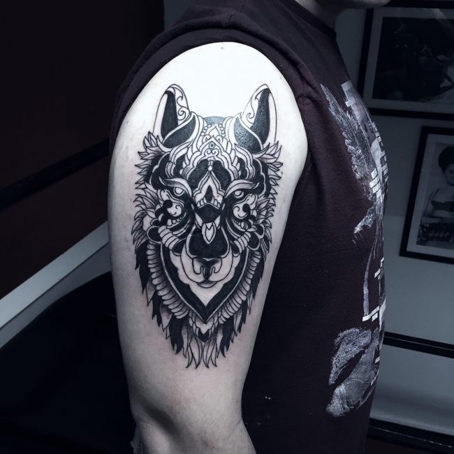 native american wolf howling at moon tattoos