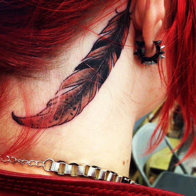 owl feather tattoo behind ear