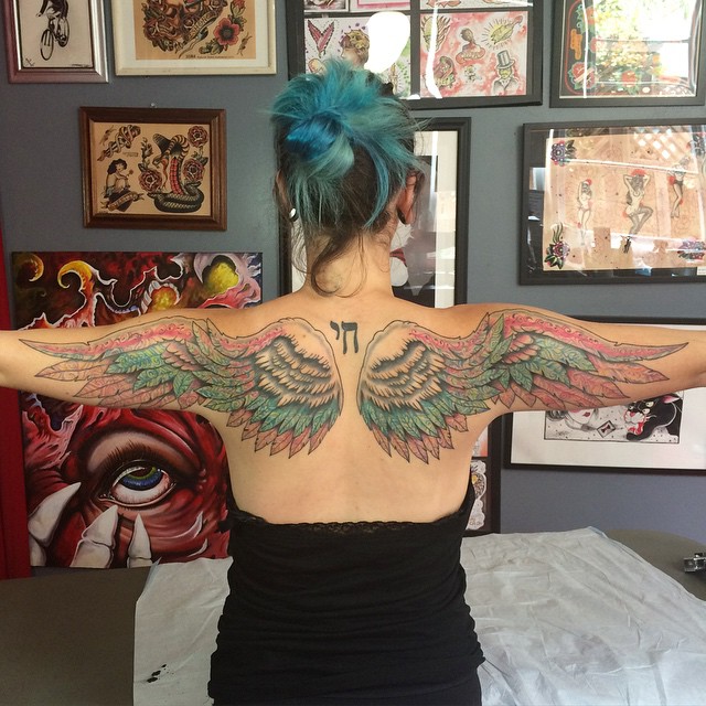 angel wings back tattoo girl