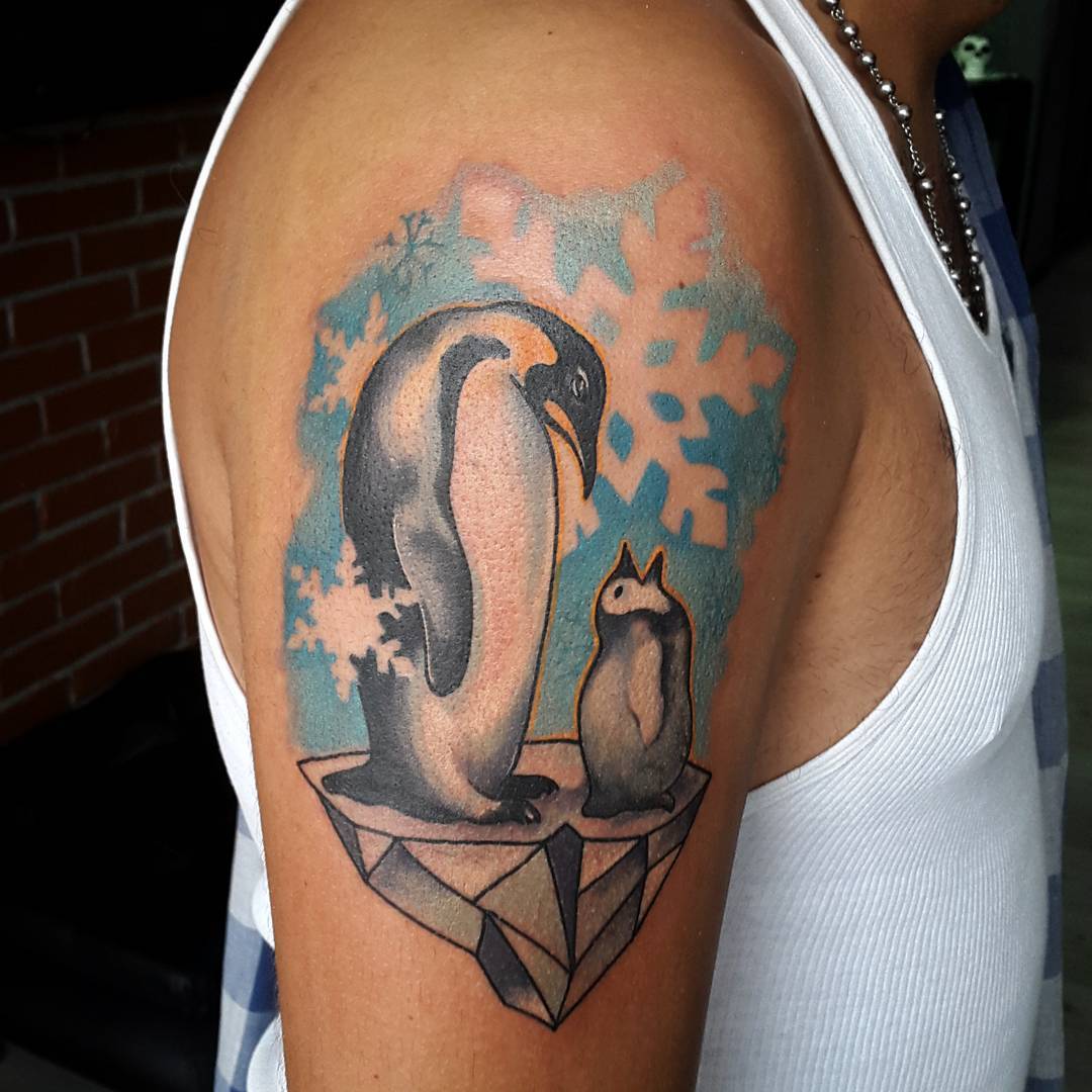 tribal penguin heart tattoo