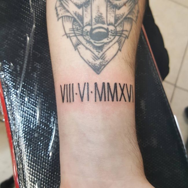 Roman numeral tattoo