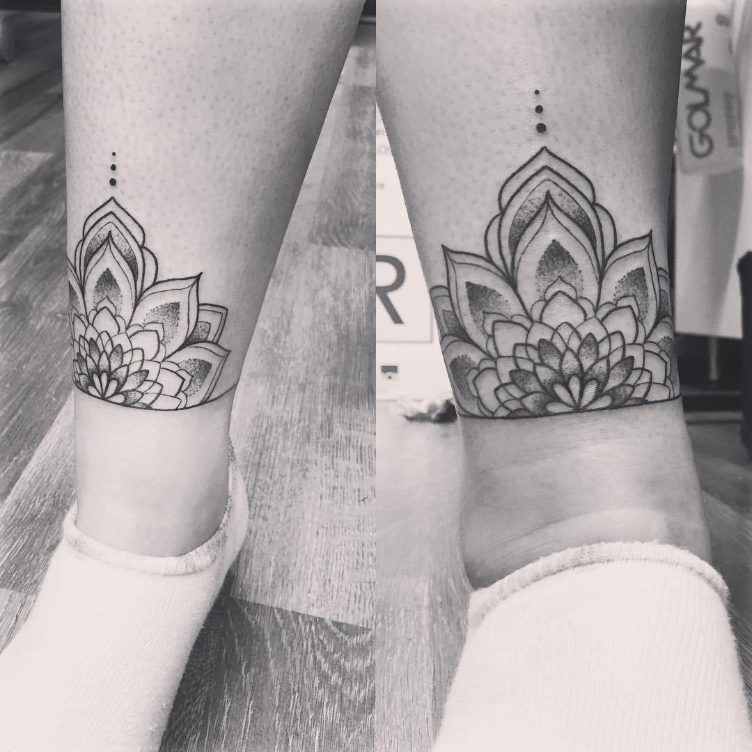 Symbol ankle tattoos.
