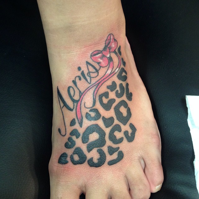 cheetah print tattoos with names