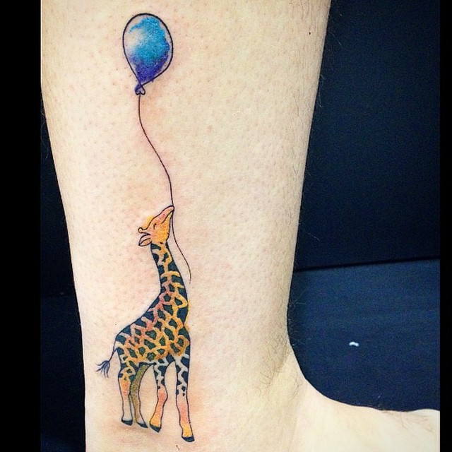 giraffe watercolor tattoo