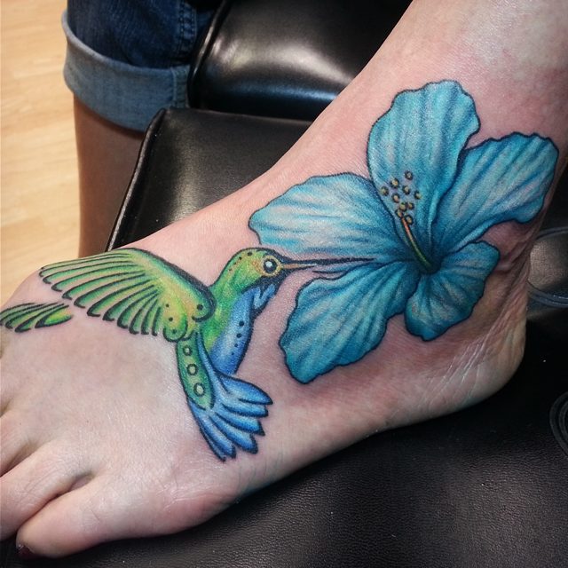 Pin by Melanie H. on Etc... | Jamaican tattoos, Bird and flower tattoo,  Rasta tattoo