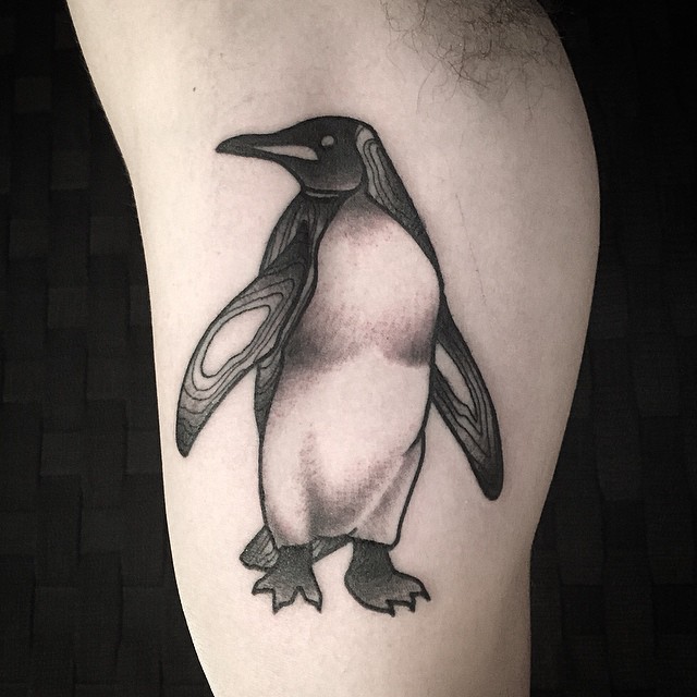 tribal penguin heart tattoo