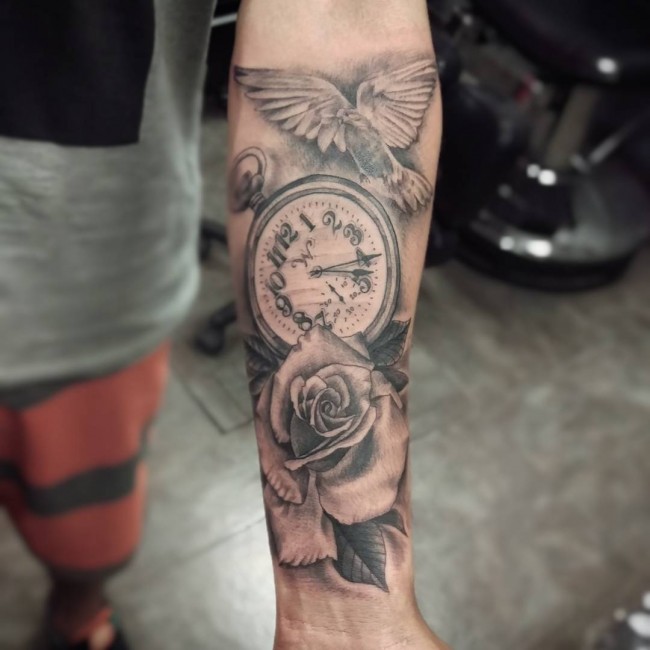 forearm rose tattoo for guys