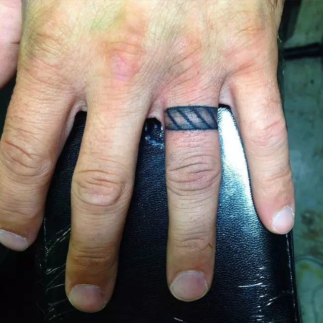 Ring finger cross tattoos | Cross finger tattoos, Tattoo wedding rings, Ring  tattoo designs